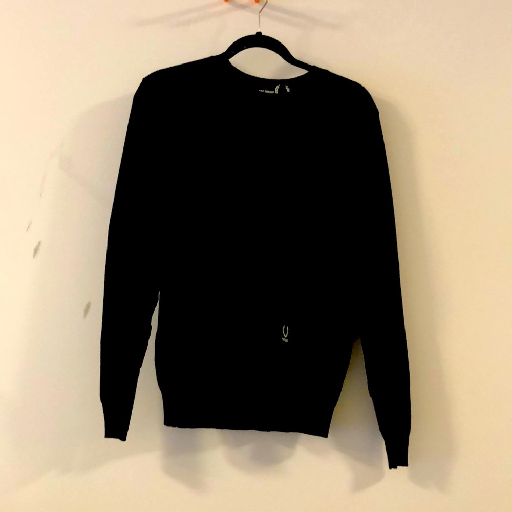 Black wool and acrylic knit sweater by RAF Simons and Fred Perry.